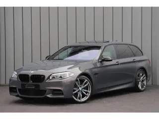 BMW 5 Serie Touring M550xd | Luchtvering | Head-up | Massage | Bang&Olufsen | Entertainment achter |
