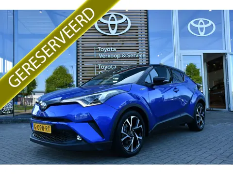 Toyota C-HR 1.8 Hybrid Bi-Tone Automaat 122pk | Premium Pack | Trekhaak | Park Assist | NL-auto |