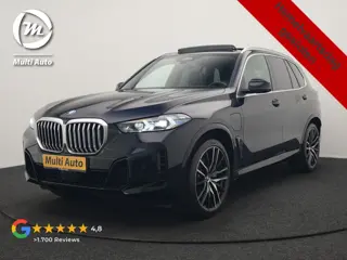 BMW X5 xDrive50e M Sport PHEV 490pk Dealer O.H. | Panodak Sky Lounge | Luchtvering | Head Up | 360 C