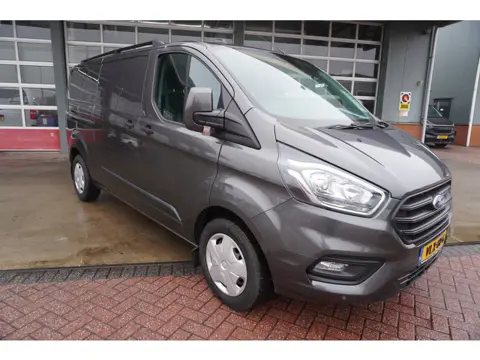 Ford Transit Custom 320 2.0 TDCI 130PK L2H1 Trend Nr. V102 | Airco | Cruise | Camera | Apple CP - An