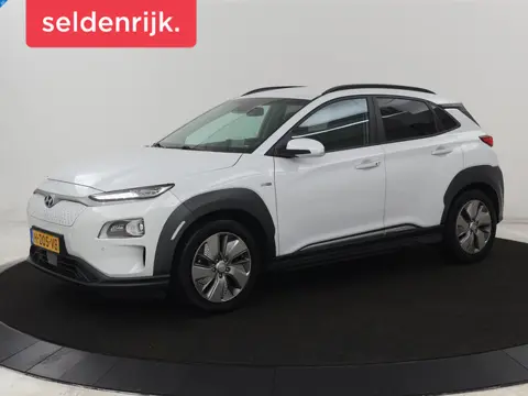 Hyundai Kona EV Premium 64 kWh | SOH 100% | 3 Fase |  Stoelventilatie | Leder | Head-Up | Warmtepomp