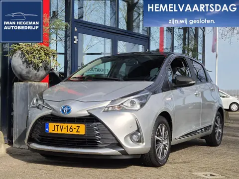 Toyota Yaris 1.5 Hybrid | Navigatie | Lederen bekleding | Schuif/kanteldak | Climate Control | Licht