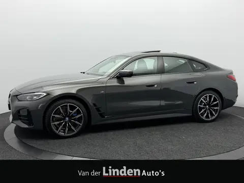 BMW i4 eDrive40 84 kWh M Sport Pro SOH 97,4% | Wegklapbare Trekhaak | 360° Camera | Harman/Kardon | 
