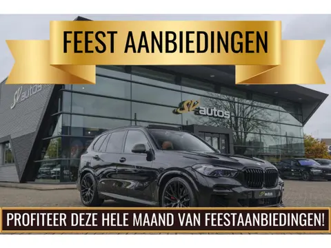 BMW X5 xDrive45e 394pk M-sport AC Schnitzer Panoramadak X5M Seats 4-wielsturing Carbon Laser 22" LMV