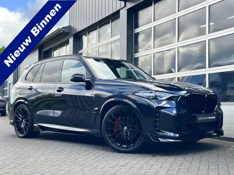 BMW X5 xDrive50e | M-pakket | Spoilerpakket | Panodak | Luchtvering | Trekh | 24 mnd Premium Garanti