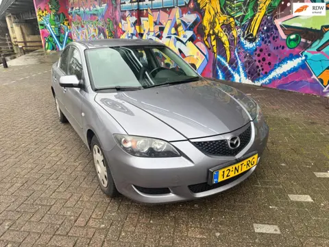 Mazda 3 1.6 Touring met Let op originele km stand van 150.000 km nap airco heeft roest aan wiel rand