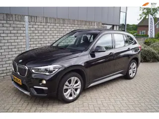 BMW X1 XDrive20i High Executive Autom Panodak Leder Sportst Stoelverw Navi Head-Up Clima Cruise 2x P