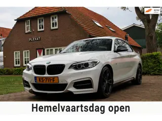 BMW 2-serie Coupé M235i High Executive | M-pakket | Panorama | HANGESCHAKELD | H&K | Apple Carplay |