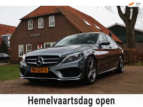 Mercedes-Benz C-klasse 180 Business Solution Aut. | AMG-Pakket | Panorama | Camera | Full Led Koplam