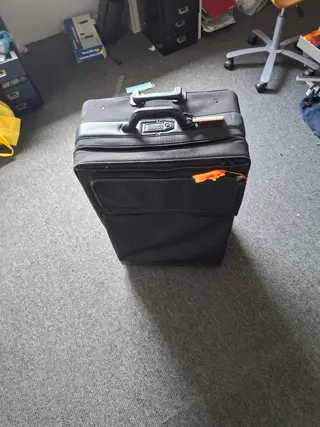 Grote rijdende koffer