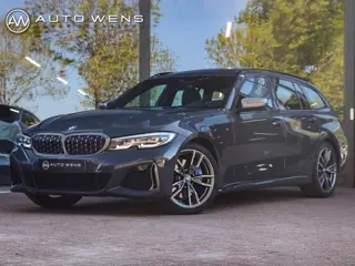 BMW 3-serie Touring M340i xDrive 387PK Dravitgrau HUD Panodak Memory Harman Kardon