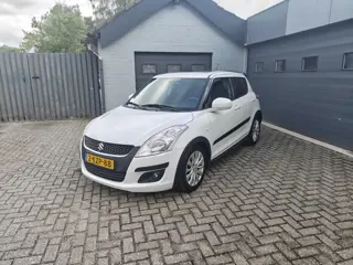 Suzuki Swift 1.2 Exclusive,Panoramadak,Cruise control,Climate control,Navi,Automaat