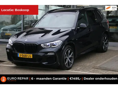 BMW X5 XDrive45e High Executive PANO-DAK DEALER. OND. NL-AUTO! SOH 82,3%
