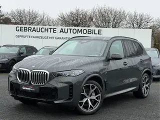 BMW X5 xDrive50e 489pk M-Sport Lucht Swarovski Trekh HUD 4W-best Zetels H&K Laser Alcant.Hemel VOL!