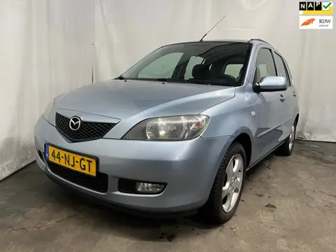 Mazda 2 1.4 Touring - Schade