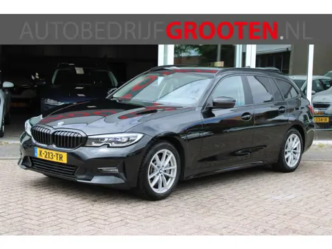 BMW 3 Serie Touring 330e High Executive (bj 2021)