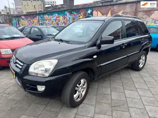 Kia Sportage 2.0 CVVT M-bition navigatie automatische airco elektrische ramen half leer zeer Leuke c