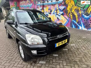 Kia Sportage 2.0 CVVT M-bition navigatie automatische airco elektrische ramen half leer zeer Leuke c