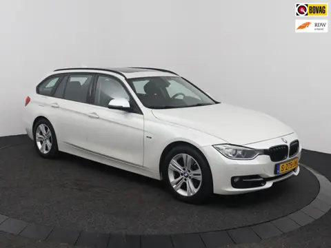 BMW 3-serie Touring 320i I AUTOMAAT I LEER I XENON I TREKHAAK