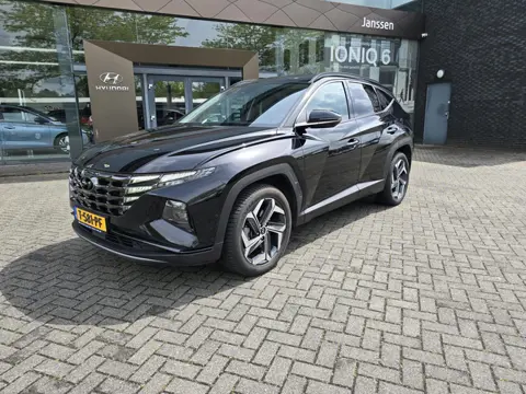 Hyundai Tucson 1.6 T-GDI HEV Premium + trekhaak 1e eig.
