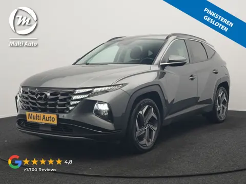 Hyundai Tucson 1.6 T-GDI Comfort 4WD PHEV 265pk Dealer O.H. | Adaptive Cruise | Trekhaak Afn. |  Cam