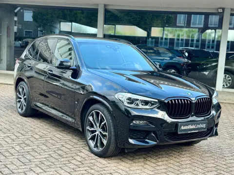 BMW X3 XDrive30e High Executive|M Pakket|Camera|HUD|Trekhaak|CarPlay|Zwart-Zwart