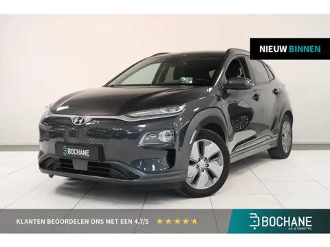 Hyundai Kona EV Premium 64 kWh | Camera | Warmtepomp | SoH 98% | Adaptieve cruise | Navigatie | Stoe