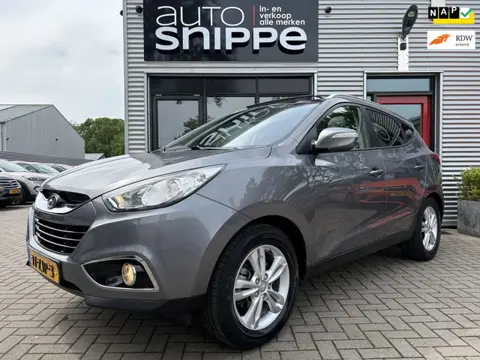 Hyundai Ix35 2.0i Business Edition -AUTOMAAT-CLIMA-CRUISE-OPEN DAK-TREKHAAK-1600 KG TREKGEWICHT-ORIG