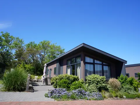 Zonnig en hip chalet ideaal gelegen bij de zee en De Cocksdorp