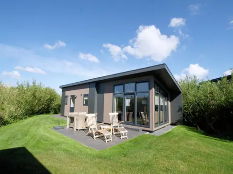 Luxe stijlvol chalet in de duinen bij de vuurtoren en De Cocksdorp