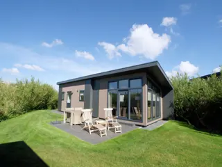 Luxe stijlvol chalet in de duinen bij de vuurtoren en De Cocksdorp