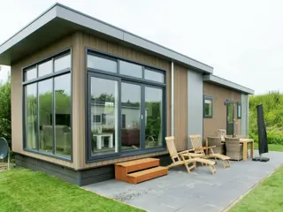 Trendy luxe chalet met veel lichtinval in de duinen bij De Cocksdorp