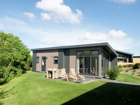 Luxe stijlvol chalet in de duinen bij de vuurtoren en De Cocksdorp