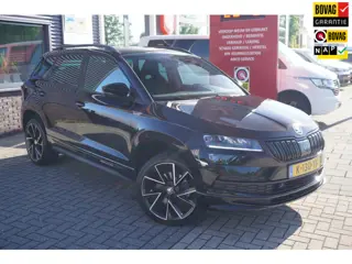 Skoda Karoq 1.5 TSI ACT Sportline Business / Stoel en stuurverwarming / Cruise / Carplay / Camera