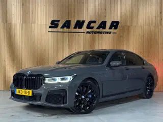 BMW 7-serie 745e High Executive M-sport Carbon Core PANO|SOFT CLOSE|HUD|H&K|SHADOW|LASER|MASSAGE V&A