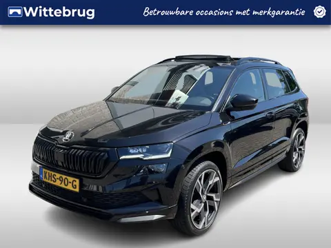 Škoda Karoq 1.5 TSI ACT Sportline / AUTOMAAT/ PANO/ TREKHAAK/ DCC/ STUUR+STOELVERWARM./ ACC/ PARK.SE