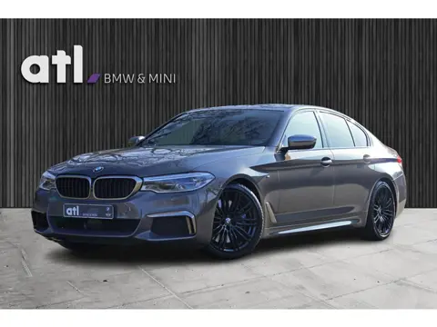 BMW 5-serie M550i xDrive High Executive Vol | HUD | Schuifdak | B&W | Soft Close | Massage | Driv as