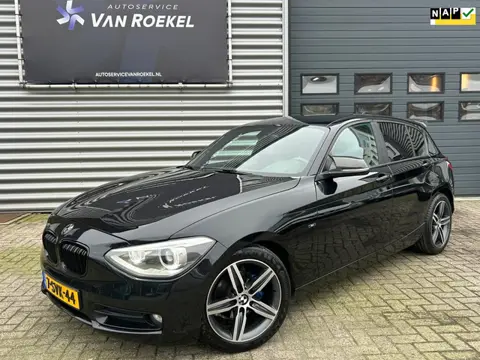 BMW 1-serie 116i Sport | PDC | Navi | Clima | Cruise | Bluetooth