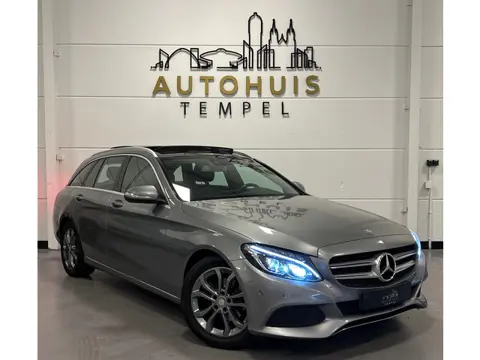 Mercedes-Benz C-klasse Estate 180 Prestige Automaat Stoelverwarming Airco Led Pano Leder/Stof Cruise