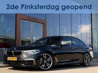 BMW 5 Serie M550i xDrive High Executive | 4WS | Soft-Close | Pano | B&W | Massage | Memory | Rear En