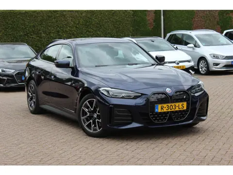 BMW i4 eDrive40 High Exe. M Sport 84 kWh / SoH 91,1% / Camera / Head-up / Leder / 18'' / Luchtvering