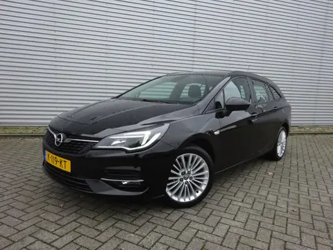Opel Astra Sports Tourer 1.2 Business Edition 1e Eigenaar - Airco / Navi / Cruise / Parkeers. / Trek