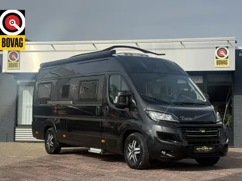 Karmann dexter 625 automaat 150 pk buscamper lengte bedden airco leder luifel trekhaak lmv 16 inch r