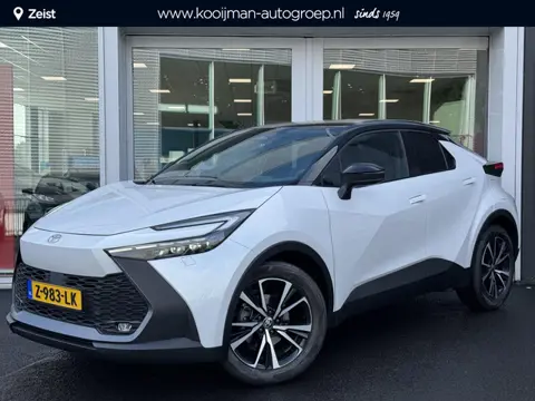 Toyota C-HR 1.8 Hybrid 140 Style Bi-Tone | Unieke tellerstand!! | Dodehoeksensor | Stoelverwarming |