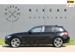 BMW 1-serie 116i Centennial High Executive AllSeason Dakspoiler !!NIEUWBINNEN!!