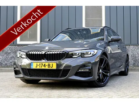 BMW 3 Serie Touring 320i M-Sport Rijklaarprijs-Garantie Panorama dak trekhaak Sport interieur Led Ca