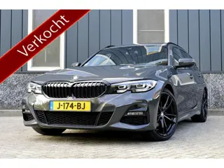 BMW 3 Serie Touring 320i M-Sport Rijklaarprijs-Garantie Panorama dak trekhaak Sport interieur Led Ca