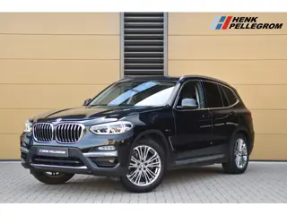 BMW X3 xDrive20i High Executive * Sportstoelen * Stuurverwarming * Trekhaak * Privacy glass *