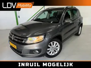 VOLKSWAGEN TIGUAN 1.4 TSI Sport & Style / Trekhaak / Park assist / PCD Voor & Achter / Navi / Bluetooth / Historie aanwezig.
