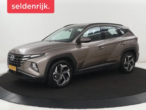 Hyundai Tucson 1.6 T-GDI PHEV Comfort 4WD | SOH 97,9% | Adaptive cruise | Camera | Carplay | Navigat